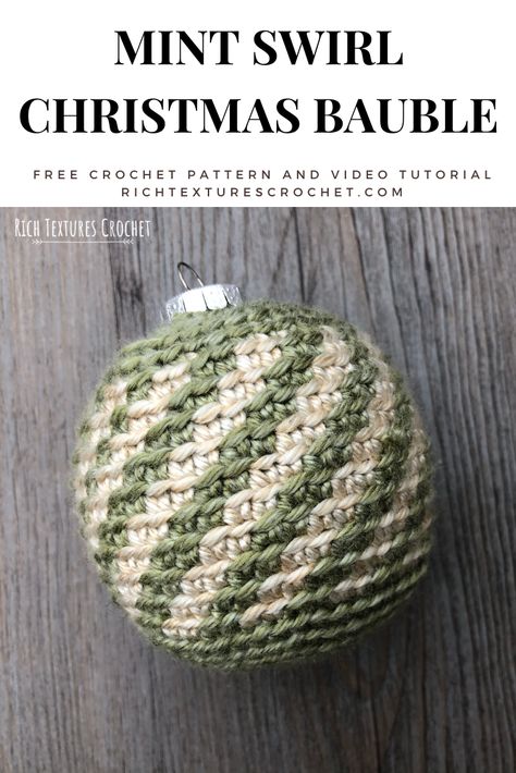 Learn how to crochet this Christmas ornament with this free crochet pattern and video tutorial.  #crochet Crocheted Christmas Baubles Free Pattern, Christmas Bauble Crochet Pattern Free, Crocheted Balls Free Pattern, Christmas Balls Crochet, Christmas Crochet Baubles, Crochet Christmas Baubles Free Pattern, Crochet Christmas Bulbs, Crochet Christmas Balls Pattern Free, Glass Ball Ornament Ideas