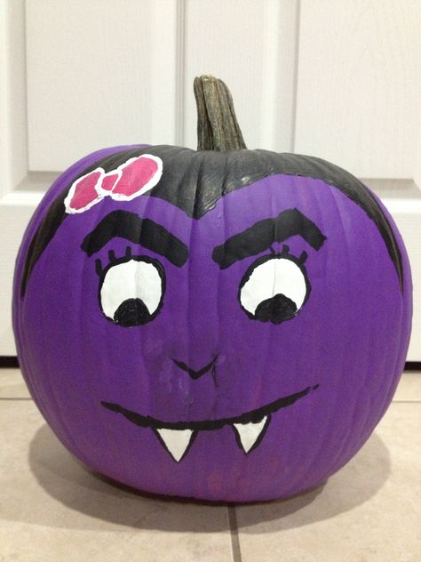 Cute vampire painted pumpkin. Vampire Pumpkin Ideas, Dracula Pumpkin Painted, Vampire Painted Pumpkin, Purple Pumpkin Ideas, Halloween Pumpkins Painted Easy, Purple Painted Pumpkins, Purple Pumpkin Painting Ideas, Pumpkin Painting Designs Easy, Vampire Pumpkin Painting