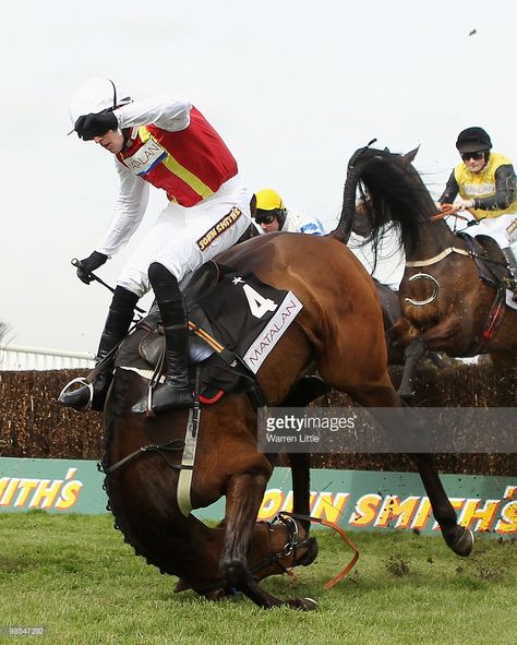 Jason Maguire takes a fall ridding Khachaturian in The matalan.co.uk Mildmay Novices' Steeple Chase at Aintree racecourse on April 9, 2010 in Liverpool, England. Dangerous Sports, Thoroughbred Horse Racing, Thoroughbred Horse, Horse Jumping, Thoroughbred, Horse Racing, Liverpool, England, Horses