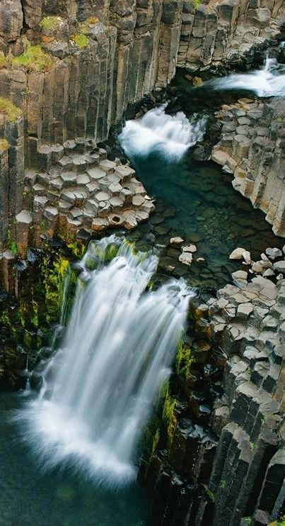 At Litlanesfoss, the waterfall cross-sections an ancient lava flow, which formed columns as it cooled. http://photography.nationalgeographic.com/photography/photo-of-the-day/litlanesfoss-waterfall-iceland/ Iceland Pictures, Phrasal Verbs, Iceland Travel, Beautiful Waterfalls, Pretty Places, Places Around The World, Amazing Nature, Natural Wonders, Beautiful Landscapes