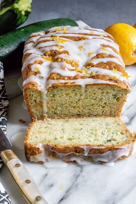 This moist one-bowl zucchini cake / courgette cake is a great way to use up seasonal gluts. The cake has reduced sugar, so much of the sweetness comes from the lemon drizzle. The flavour of the courgette fades away beneath the zingy lemon, but leaves pretty flecks of green. #zucchinirecipe #courgetterecipe #courgettecake #zucchinibread Lemon And Courgette Cake, Courgette And Lemon Cake, Courgette Cake Recipe, Courgette Cake, Yummy Cake Recipes, Children Cake, Cake Courgette, Vegetable Cake, Cake Loaf