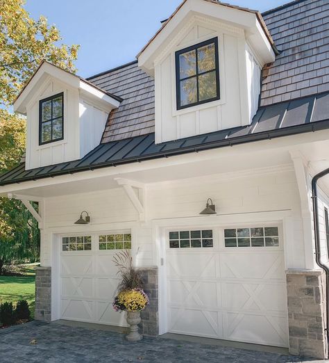 summerhill developers 🏠 on Instagram: “farmhouse garage doors and window dormers bring character to the Simcoe streetscape 🖤⠀ ⠀ ⠀ ⠀ ⠀ #modernfarmhouse #boardandbatten…” Modern Farmhouse Garage Door, Ranchette Ideas, Farmhouse Garage Door, Modern Farmhouse Garage, Farmhouse Exteriors, Hardie Board, Farmhouse Garage, House Images, Hardie Siding