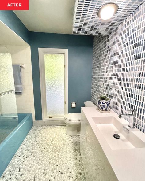 Blue Bathtub Bathroom Ideas, Blue Tub Bathroom Ideas, White Wallpaper Accent Wall, Pebble Flooring, Karen Graham, Blue Bathtub, Diy Remodeling, Tub Remodel, Blue Glass Tile