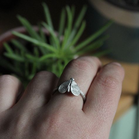 A dainty and adjustable Sterling silver moth ring which I hand sculpture first in red wax as you can see in the last photo and then using the lost wax method (an ancient technique to create jewelry) I turn it into a sterling silver moth ring. The moth has been soldered in a round texture adjustable band . The finish is matte and lightly oxidized just to help the texture stand out. Ideal gift for insect and animal lovers. Moths are magical creatures linked with the moon and the spirit world; they Moth Ring, Lost Wax Jewelry, Animal Rings Jewelry, Insect Ring, Organic Earrings, Wax Ring, Hand Sculpture, Insect Jewelry, Jewelry Dainty