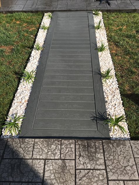 Trex walkway Decking Walkway Pathways, Outdoor Sidewalk Ideas, Walkway Fence Ideas, Boardwalk Front Walkway, Front Lawn Walkway Pathways, Composite Walkway Pathways, Trex Walkway Ideas, Wood Pavers Walkways, Walkway Entrance Ideas