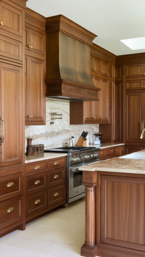 Close-up of modern kitchen with sleek, dark walnut cabinets, white quartz countertops, stainless steel appliances, and minimalist décor, showcasing the warm grain and natural finish of the wood. Walnut And Cream Interior, Redwood Kitchen Cabinets, Kitchen With Medium Wood Cabinets, Walnut Stain Kitchen Cabinets, Walnut Wood Cabinets, Traditional Kitchen Design Wood Cabinets, Walnut Stained Kitchen Cabinets, Stained Kitchen Cabinets 2024, Cherrywood Cabinet Kitchen