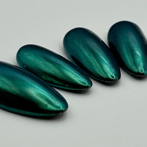 Pictured in Almond M Black Apres gel-x nails topped with teal, turquoise, green and blue colorshift chrome. Made to order nails, different lengths and shapes available.  All of our chrome nails are made with soft gel tips, base gel, color gel, chrome powder, builder gel (for extra shine, structure and reinforcement) and topcoat to seal it altogether. These nails are reusable and handmade to last! We don't offer returns or refunds due to sizing errors. Do you need help finding your size? Ordering Turquoise Chrome Nails, Blue Chrome Nails, Dark Mermaid, Green Mermaid, Chrome Powder, Mermaid Nails, Gel Tips, Dark Teal, Powder Nails