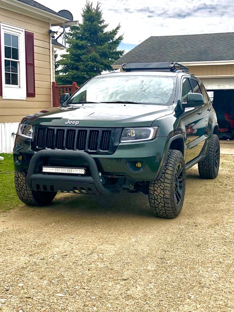 2011 Jeep Grand Cherokee WK2 3.6L 4x4. Dark Forrest Green. Bull bar, Rocky Road lift kit, 265/65R18 Falken Wildpeak, Cargo Roof Basket, Black MB TKO 18x9-0 offset wheels, Wilco Tiregate. Dark Green Jeep, Grand Cherokee Lifted, Jeep Compass Trailhawk, Jeep Grand Cherokee Accessories, Jeep Wk, Jeep Srt8, Jeep Cherokee Trailhawk, Jeep Wj, Green Jeep