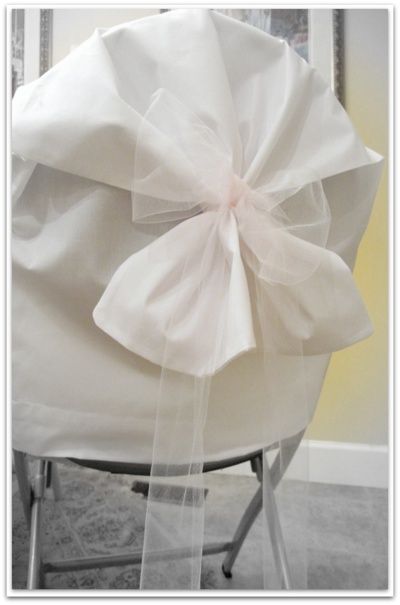 Anyone who has thrown a semi-formal party or planned a wedding knows that chair covers are a huge cost.  I'll let you in on a secret.  Pillowcases. Diy Folding Chair Covers, Chair Covers For Wedding, Cheap Chair Covers, Diy Chair Covers, Chair Covers Party, Chair Back Covers, Folding Chair Covers, Metal Folding Chairs, Party Chairs