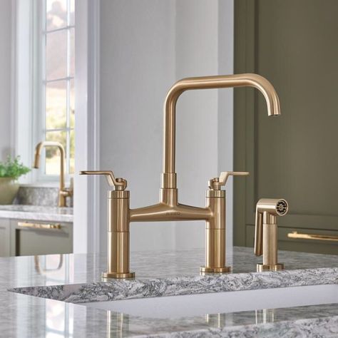 A gold finish adds a touch of warmth to olive green cabinetry in a colorful, stylish kitchen featuring the Litze Bridge Faucet with Square Spout and Industrial Handles in Brilliance Luxe Gold. http://bit.ly/2wcdcuR Brizo Kitchen Faucet, Brizo Litze, Bridge Faucet Kitchen, Bridge Faucet, Sky Lights, Linen Cabinets, Bar Faucet, Barn Interior, Bathroom Linen Cabinet