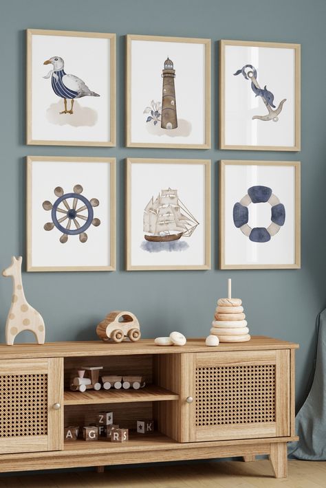 Introducing our exquisite set of 6 Nautical Nursery Prints, designed to transform your little one's space into a captivating maritime haven.Bring the allure of the sea into your child's nursery with our set of 6 Nautical Nursery Prints. Watch as their eyes light up with wonder and their imagination sets sail on countless adventures. Whether as a gift or a cherished addition to your own home, these prints will create a truly magical and inspiring environment for your little one. Upscale Playroom, Boat Nursery Theme, Nautical Nursery Ideas, Vintage Nautical Nursery, Coastal Nursery Boy, Boy Nursery Nautical, Nautical Boys Room, Nautical Boy Room, Nautical Baby Nursery