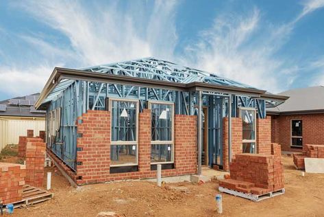 Steel Vs. Wood Framing for Your Home - Today's Homeowner Metal Building Home, Building Home, Steel Frame House, Brick Construction, Steel Frame Construction, Frame House, Residential Construction, Small Buildings, Construction Cost