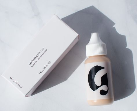 Glossier Perfecting Skin Tint in Medium: Review and Swatch Glossier Skin Tint Aesthetic, Glossier Foundation, Glossier Skin, Glossier Skin Tint, Glossier Perfecting Skin Tint, Glossier Tint, Skincare Wishlist, Glossier Boy Brow, Glossier Cloud Paint