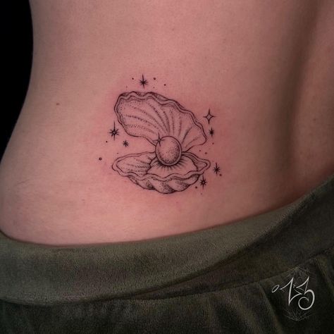 A delicate dot work clam shell on the lower back for Riley! ✨Thank you again! Studio Owner/Tattoo Artist - Zoe Litz @zx3bih Located @zx3artistry in Cocoa Beach, Florida Tattoo made with love using supplies by @dead_raven_tattoo_supply @painfulpleasures @allegoryink @recoveryaftercare @inkjetstencils #zx3ink #zx3artistry #zx3 #clamshelltattoo #clamtattoo #dotwork #dotworktattoo #cocoabeachtattoo #lowerbacktattoo #seashelltattoo #femaletattooartist Pearl Clam Tattoo, Tattoos With Pearls, Shell Pearl Tattoo, Ocean Moon Tattoo, Clam And Pearl Tattoo, Snail Shell Tattoo, Clamshell Tattoo, Shell With Pearl Tattoo, Sea Shell Tattoos