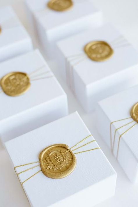 Image 50 of White & Gold Wedding In Athens Riviera White And Gold Wedding Favors, Wax Seal Favor Boxes, White And Gold Packaging, Gold Packaging Design, Wedding Favors Boxes, Favor Boxes Wedding, Diy Favor Boxes, Gold Favor Boxes, Riviera Wedding