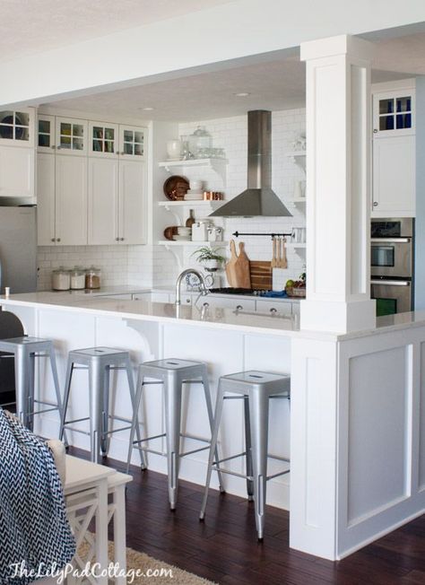 White Cottage Kitchen trimmed out support beam. Corbels. Raised bar. (We do not have room for stools.) White Cabinets, Corner Counter, Support Beam, Flipping Houses, Kitchen Plans, Kitchen Counter, Summer House, Farmhouse Kitchen, A Kitchen