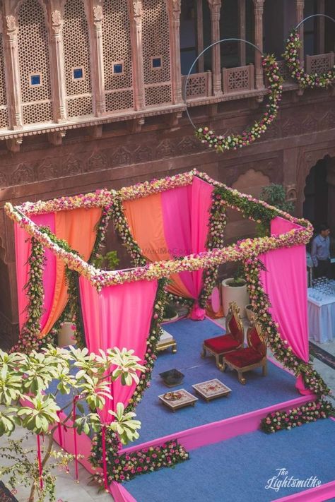 Stunning pink and orange floral mandap decor with drapes #wedmegood #indianwedding #decor #decoration #decorideas #flowers #floral #floralmandap #pink #orange #wedding #mandap Mandap Design, Wedding Setup, Wedding Hall Decorations, Orange Wedding Flowers, Stage Decor, Mandap Decor, Marriage Decoration, Desi Wedding Decor, Mehndi Decor