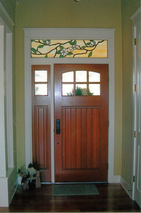 Custom stained glass window above a door.  Magnolia design.Created by Designer   Art Glass in Daytona Beach Fl. Interior Door With Window, Over The Door Decor, Window Above Door, Custom Front Doors, Window Stained, Stained Doors, Stained Glass Door, Door Inspiration, Custom Stained Glass