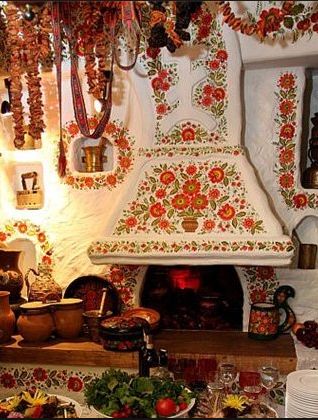 That's inside beautifully painted Ukrainian home! It looks a little like Rapunzle's  home from the Tangled cartoon. Ukrainian Food, Ukrainian Recipes, Russian Culture, Ukrainian Art, Eastern European, Arte Popular, Kiev, Stove, A Table