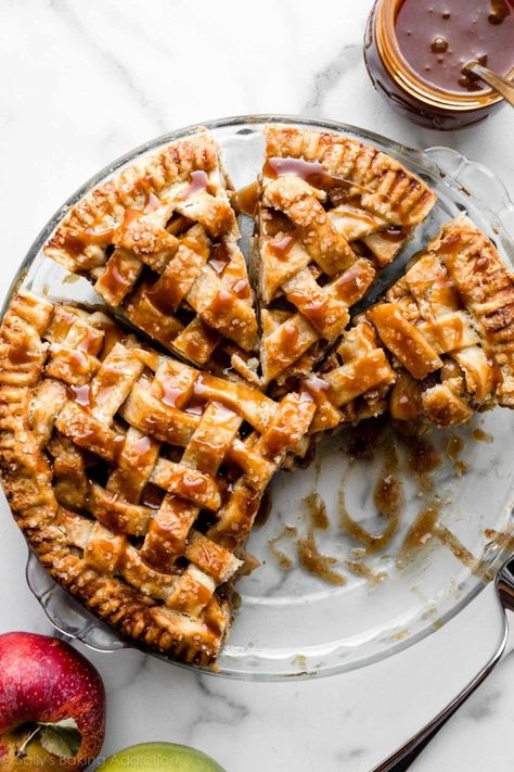 This is salted caramel apple pie, and it has all of the flavor you love from caramel apples, with the added bonus of a buttery flaky pie crust. It's always one of the top-rated Thanksgiving pies on my website, but you don't need to wait for a special holiday to make it. Top with vanilla ice cream for a dessert that dreams are made of! Recipe on sallysbakingaddiction.com Apple Pie With Cheese, Braided Pie Crust, Buttery Flaky Pie Crust, Lattice Pie Crust, Salted Caramel Recipes, Traditional Apple Pie, Salted Caramel Apple Pie, Pie Crust Designs, Caramel Apple Pie