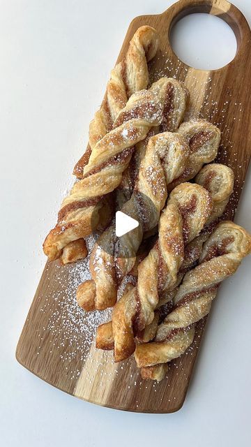 Ashley Lamego ♥ on Instagram: "Cinnamon Twists ✨

1 puff pastry sheet 
1/2 cup of sugar 
2 tsp of cinnamon 
3 tbsp of butter (melted) 
Icing sugar for garnish 

Thaw your puff pastry sheet (it should still be cold to the touch). Roll it out slightly, but make sure to keep its rectangular shape. 
In a bowl combine sugar and cinnamon. 
Brush melted butter onto one side of the puff pastry sheet and cover with cinnamon sugar mixture. 
Allow the butter to absorb the sugar mixture. 
Fold the puff pastry sheet in half and cut equal strips. 
(About 11-12 strips) 
Pinching the ends of each strip twist the puff pastry about 4-5 times and place on a lined baking tray. 
Repeat this step for all the strips. 
Coat each twist with melted butter and sprinkle with cinnamon sugar. 
Bake at 400 F for about 1 Cinnamon Rolls Shapes, Twisted Cinnamon Rolls, Cinnamon Twists Puff Pastry, Puff Pastry Uses, Pastry Shapes Ideas, Puff Pastry Cinnamon Twists, Desserts With Puff Pastry Sheets, Recipes With Puff Pastry, Shaped Cinnamon Rolls