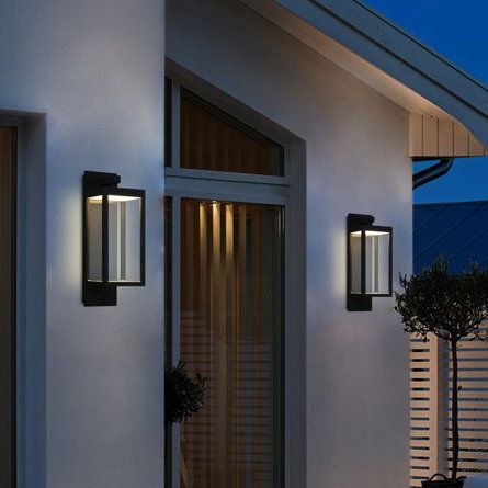 Latitude Run® Elah 14.25" H Integrated LED Outdoor Armed Sconce | Wayfair Stainless Steel Lamps, Grey Lamp, Patio Fence, Outdoor Flush Mounts, Luminaire Mural, Outdoor Wall Lantern, Porch Lighting, Led Wall Lights, Hollow Design