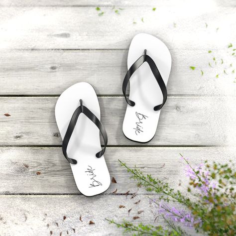 18.03 USD All-day comfort is the name of the game when summer is on. These personalized flip flops can now take on your unique designs add some character to your summer escapades. With an easy slip-on design, a cushioned footbed, and top-tier printing fidelity, these flip flops are a guaranteed summer hit. .: 5/8" (15 mm) thick EVA sole .: 100% polyester suede sole cover .: Black PVC strap .: Multiple sizes Beach Wedding Flip Flops, Flip Flops Wedding, Bride Flip Flops, Bridesmaid Flip Flops, Bride Hoodie, Burgundy And Blush Wedding, Flower Girl Petals, Bridal Flip Flops, Personalized Flip Flops