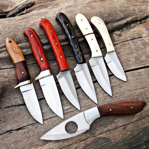 Custom Handmade Unique Set/Lot of 7 Different Knives with leather sheath - Best Gift For Him / Her These can serve purpose as hunting knives, skinners and as chef knives set too. Different designs and materials made this set a unique gift for your loved ones. Blade Material: All knives are made of D2 Steel Handle Material: 5 knives have wooden handle and 2 knives have camle bone handle Note: Package contains 7 knives same as shown in pictures. These superb design knives are hand forged and... Skinning Knife, Collectible Knives, Chef Knives, D2 Steel, Chef Knife Set, Best Gifts For Him, Custom Knife, Bowie Knife, Handmade Knives