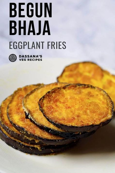 Brinjal (baingan) or eggplant/aubergine is a vegetable that is extensively used in Bengali cuisine. From using it in specialty curries, dry preparations to frying it, brinjal plays a significant role in Bengali vegetarian cuisine. Here’s one such quintessential brinjal recipe from this cuisine – the Begun Bhaja. Also known as Baingan Bhaja, it is easy to make, crispy eggplant fries that are delicious as a snack, side or appetizer. This recipe is also vegan friendly and gluten free. Begun Bhaja, Brinjal Recipe, Bitter Gourd Fry, Healthy Indian Snacks, Dal Rice, Eggplant Fries, Bengali Cuisine, Arduino Led, Bengali Recipes