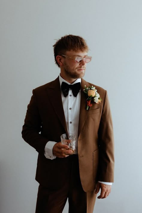 Grooms Suit Ideas Wedding, Colored Wedding Suits Men, Brown Suit Groom And Groomsmen, Brown Suit Bow Tie, Brown Tuxes Wedding, Brown Tuxedo Wedding Groomsmen, Brown Suit Black Tie, Mountain Wedding Mens Attire, Elopement Outfits Groom