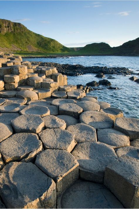 The legend goes that Northern Ireland was once home to a giant named Finn McCool. Across the Irish Sea in Scotland lived another giant named Benandonner, who threatened Finn and Northern Ireland. So Finn tore up chunks of the Antrim coastline and hurled them into the sea, creating the path known as the Giant’s Causeway. Ireland People, Backpacking Ireland, Ireland Culture, Beach Wedding Arch, Ireland Hotels, Ireland Weather, Ireland Beach, Giant’s Causeway, Irish Sea