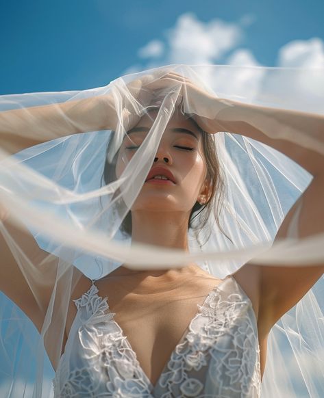 She lifted the veil, and the world around her paused, caught in the simplicity of her beauty. ✨ #VeilMoments #BridalElegance #UnderTheVeil #TimelessBride #WeddingDayMagic #QuietBeauty #RomanticGaze #SomethingBlue #BridalPortrait #foreverstartsnow #weddinginspo #bridetobe2025 #voguewedding #wedvibes Veil Editorial, Veil Photoshoot, Under The Veil, Floral Veil, White Veils, Gothic Cathedral, Vogue Wedding, Bridal Elegance, The Veil