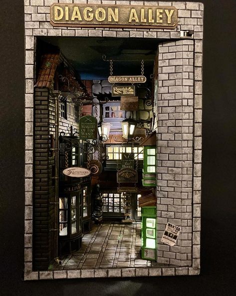 BookNook 📚Handmade 🪄 | Boon Nook Diagon Alley This Book Nook inspired by the "Harry Potter" book, adds a touch of magic to your bookshelf. Book Nooks are… | Instagram Harry Potter Bookshelf, Harry Potter Book Nook, Miniature Window, Bookshelf Insert, Shelf Insert, Custom Bookshelves, Serbia And Montenegro, Harry Potter Book, Vitrine Miniature