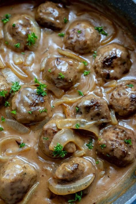 This One-Pan Meatballs and Gravy with Onions is a simple yet satisfying weeknight dinner recipe for the whole family. Easy Swedish-style meatballs smothered with a Sweet Vidalia Onion Gravy served over mashed potatoes, rice or noodles. #meatballrecipes #dinnerideas #weeknightdinnerideas #easydinnerrecipes #swedishmeatballs #onepanmeals #easydinner Sweetish Meatballs Recipe Easy, Meatball Dishes, Meatballs And Gravy, Meatball Dinner, Weekly Recipes, Vidalia Onion, Meatball Recipes Easy, Weeknight Recipes, Diner Recept