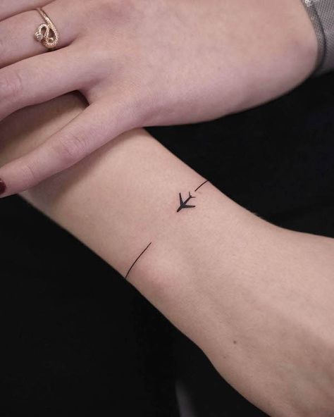 Arm Line Tattoos For Women, Air Plane Tattoo, Plane Tattoo Design, Wrist Band Tattoo, Bracelet Tattoos, Wrist Bracelet Tattoo, Pilot Career, Wrist Tattoo Cover Up, Peace Tattoos