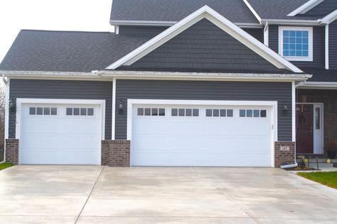 Choosing the Best Garage Door Paint Color For Your Home | Fagan Door | Fagan Door Brown Garage Door, Exterior Garage Door, White Garage Doors, Carriage Style Garage Doors, Garage Door Colors, Garage Door House, White Garage, Garage Door Paint, Carriage Garage Doors