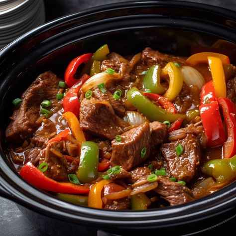 You'll never eat another version of this recipe after tasting this meat Slow Cooker Grillades, Cooktop Cove Slow Cooker Pepper Steak, Recipes Using Stew Beef, Peper Steak, Slow Cooker Pepper Steak, Beef Recipes Easy Quick, Beef And Peppers, Mini Crockpot, Crockpot Pepper Steak