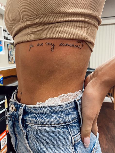 Side Tattoos With Meaning, Simple Classy Tattoos For Women, Tattoos You Are My Sunshine, Mom And Daughter Tattoos You Are My Sunshine, Your The Sun To Me Tattoo, Country Meaningful Tattoos, Cute Tattoos On Ribs, Mother Daughter Tattoos Ribcage, Family Ankle Tattoos For Women