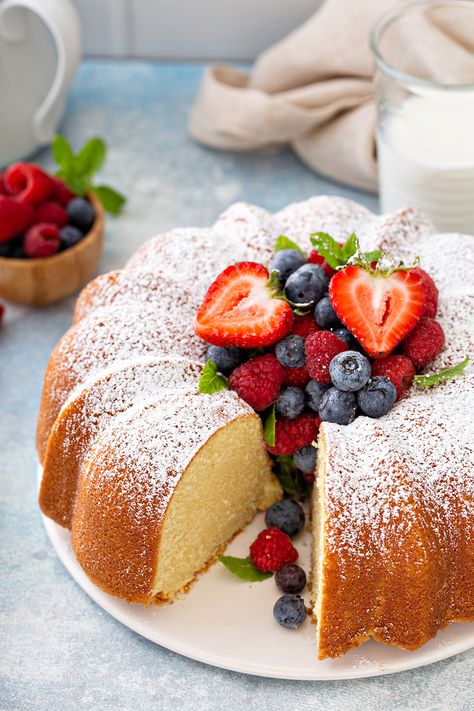 Sliced whipping cream cake on a white cake plate, garnished with fresh berries and powdered sugar Whipping Cream Cake, Recipes For Cakes, Whipped Cream Cakes, Cheese Pound Cake, Icing Recipes, Fresh Strawberry Pie, Recipes With Whipping Cream, Cream Cheese Pound Cake, Whipping Cream