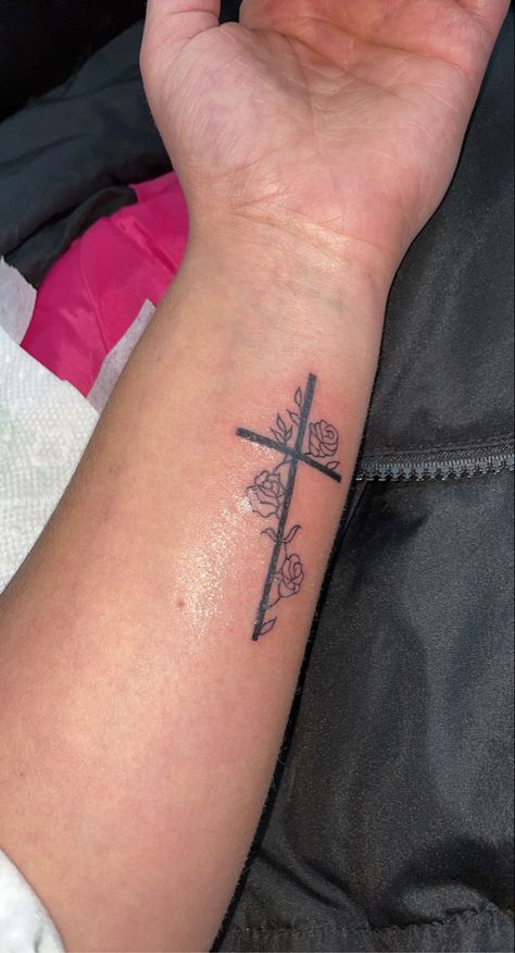 Small Tattoos For Women Cross, Cross Forarm Tattoos Woman, Small Cross Flower Tattoo, Easy Arm Tattoos For Women, Rose And Cross Tattoos For Women Design, Tattoo Ideas Female Jesus, Crucifix Tattoo For Women, Cute Cross Tattoos For Women, Rist Tattoo Ideas Female