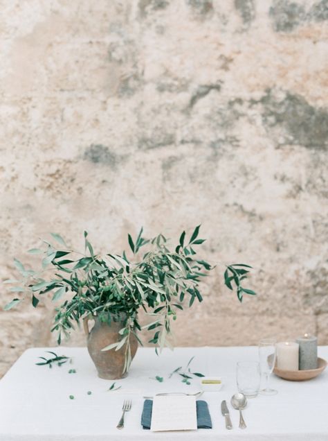 Mini Olive Trees Wedding, Wedding Table Olive Leaves, Olive Leaves Wedding Centerpieces, Italian Wedding Bouquet Olive Branches, Olive Leaves Centerpiece, Simple Tuscan Wedding, Olive Leaves Wedding Decor, Bouquet With Olive Leaves, Simplistic Wedding Decor