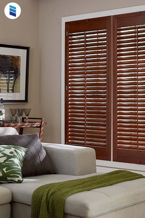 Interior wood shutters are a timeless design choice for the home. They might cost more up front, but they help improve home value, last for years, and insulate the house. Wooden Floor Ideas, Shutters Interior, Door Treatments, Rustic Shutters, Small Sectional Sofa, Shutter Blinds, Window Treatments Living Room, Window Treatments Bedroom, Interior Shutters