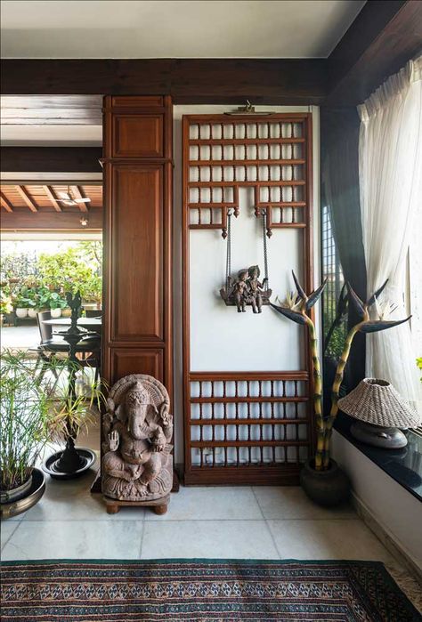 A terrace flat in Mumbai celebrates nature and brings out a modern Indian aesthetic | Beautiful Homes Foyer Indian Decor, Indian Aesthetic Interior Design, Indian Modernism Interior, Home Entrance Decor Indian Flat, Earthy Indian Interiors, Fab India Home Decor, Indian Inspired Modern Home, Modern Indian Aesthetic, Indian Aesthetic Interior