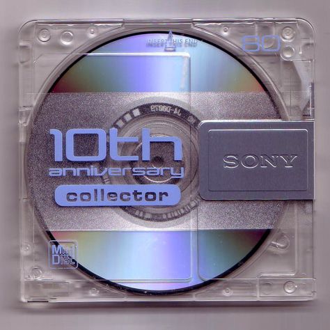 Y2K Aesthetic Institute on Instagram: “Sony MiniDisc 10th Anniversary 💽 (2002) . . #y2k #y2kaesthetic #minidisc #sony #translucent #2002 #futuristic #disc” Cd Cover, Cd, Silver