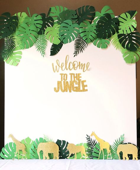 Paper Leaves and Animals for your Jungle Theme Party Wall Decor! A Fun Jungle Backdrop will brighten up any event. DIY with tropical paper leaves and your favorite glitter card stock jungle animals. #jamelloveandpaper #junglethemeparty #paperleaves #diy #animals Jungle Theme Wall Decor, Jungle Theme Decorations Backdrops, Safari Backdrop Diy, Rainforest Birthday Party Ideas, Jungle Backdrop Diy, Paper Jungle Leaves, Diy Jungle Leaves, Jungle Party Backdrop, Jungle Theme Birthday Party Diy