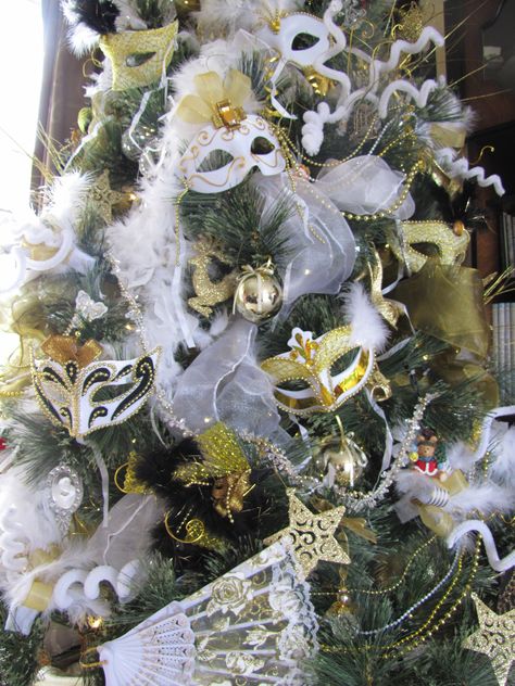 Masquerade Christmas Tree: Photo closeup. Christmas Masquerade Ball, Masquerade Christmas Tree, Christmas Masquerade, Masquerade Christmas Party, Elegant Baroque Masquerade Mask For Party, Nature Themed Masquerade Mask, Masquerade Holiday Party, Christmas Masquerade Party, Masquerade Party Decorations