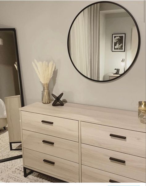 Here is a clean, modern look of this beautiful white oak dresser with matte black metal detail. A great dresser decor idea for you next place! Bedroom Dresser Decor Ideas Minimalist, Neutral Bedroom Dresser Decor, Bedroom Aesthetic Dresser, Trendy Dressers, Dresser Decor Bedroom Ideas, Bedroom Tv Dresser, Rustic Minimalist Bedroom, Dresser Ideas Bedroom, Bedroom Dresser Decor With Tv