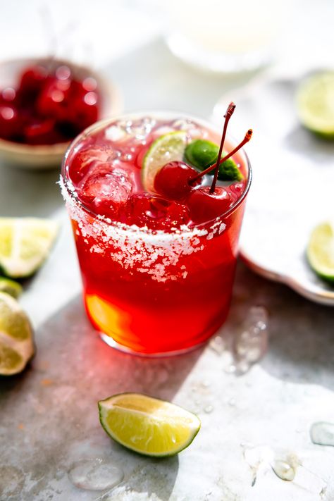 Cherry Limeade Margaritas are a fun, grown-up version of a classic summer drink. Tart limeade is mixed with a splash of sweet grenadine and smooth tequila. Serve on the rocks or blended for an icy twist. Enjoy your refreshing, sweet, and tangy cocktail! Cherry Limeade Margarita Recipe, Tart Cocktails, Garlic Butter Beef Bites, Cherry Limeade Cocktail, Cherry Cocktails, Cocktail Board, Limeade Margarita, Grenadine Cocktail, Cherry Margarita