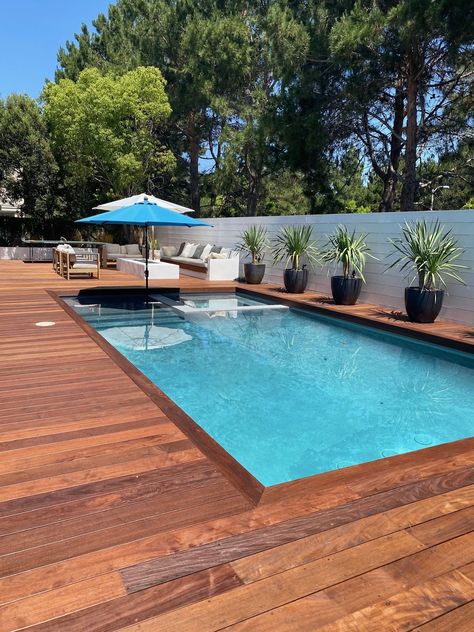 27 Stunning Pool Deck Ideas 2024: Transform Your Backyard Oasis - placeideal.com Swimming Pool Decking Ideas, Inground Pool With Deck, Pool Wood Deck, Deck Colours, Wooden Pool Deck, Concrete Decks, Wood Pool Deck, Pool Decking, Pool Inspiration