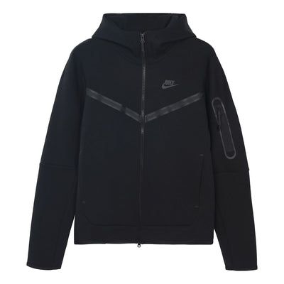 Stay warm without sacrificing style with the Nike Tech Fleece Full Zip Hoodie. This sleek, black cardigan hoodie provides extra warmth and a clean, modern look. Made from double-sided spacer fabric, it's designed to provide insulation for maximum warmth and comfort - but without the bulk. It also features a small black Nike logo on the chest along with an extra zippable pocket on the left arm for easy accessibility to all your essentials. With its smart design and professional feel, this tech fl Nike Tech Jacket, Nike Tech Hoodie, Black Nike Logo, All Black Nikes, Cardigan Hoodie, Tech Fleece Hoodie, Autumn Jacket, Mens Outdoor Jackets, Zipper Cardigan